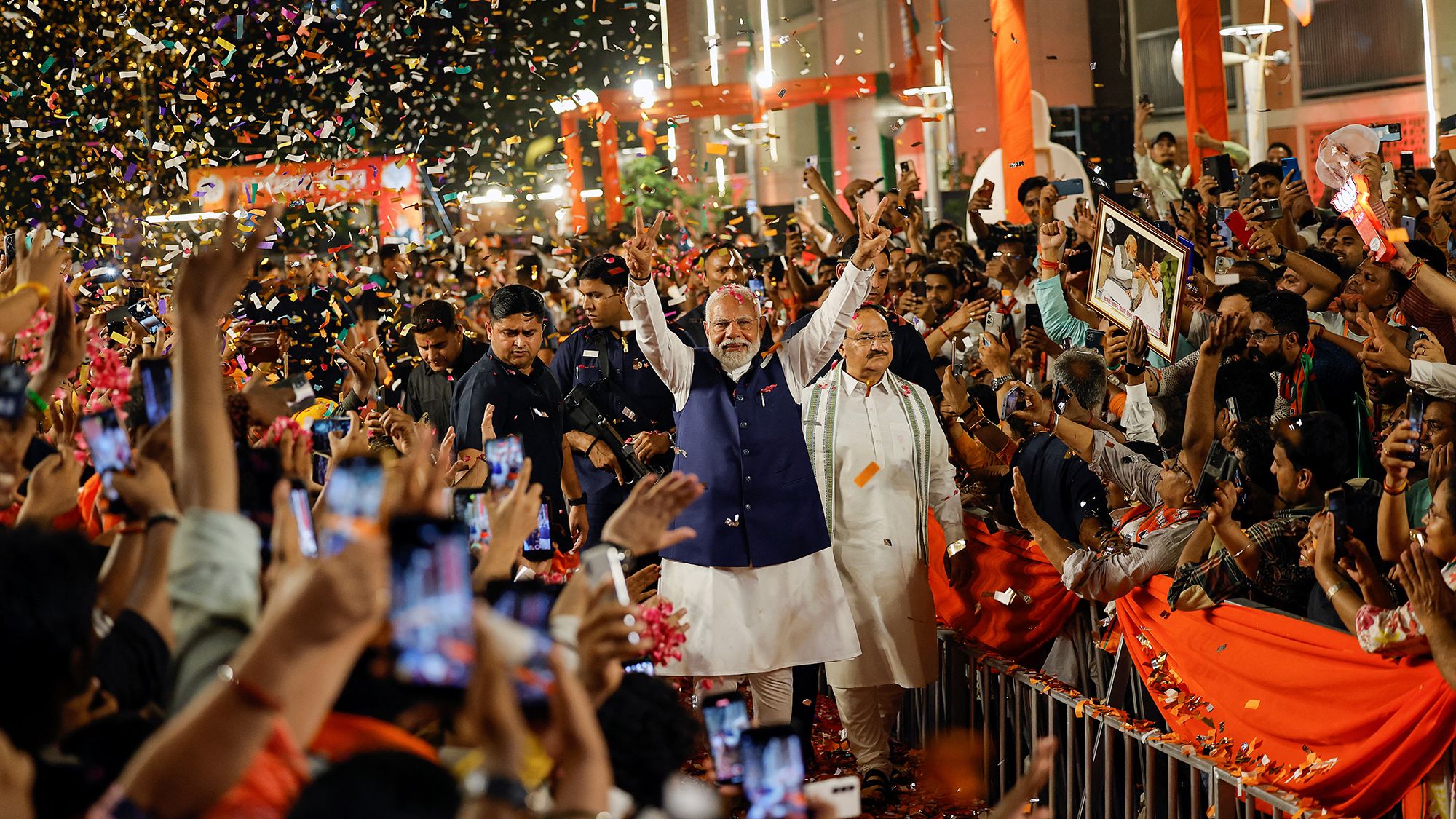 Indian Prime Minister Narendra Modi gestures as he arrives at Bharatiya Janata Party (BJP) headquarters in New Delhi, India, on June 4.