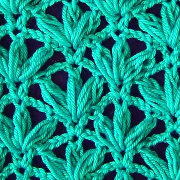 azhurnyj-uzor-s-pyshnymi-stolbikami-openwork-pattern-with-puff-stitchs1 (600x600, 483Kb)