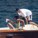 Laura Harrier – In a bikini on a boat with new beau Sam Jarou in Positano - 454 x 309