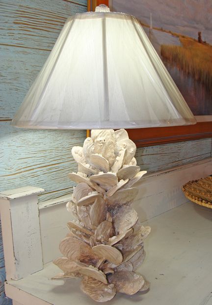 Original earthenware lamp created by Virginia artist Kevin Collins. This life-like coastal designed lamp replicates a cluster of oyster shells attached to a pole with barnacles on shells. Exceptional porcelain earthenware sculpture ready to adorn any coastal home interior.