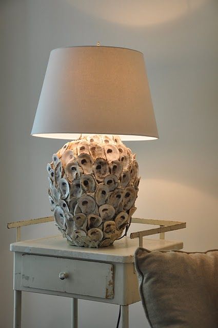 shells on old lamp. i think I have enough shells for this right now!