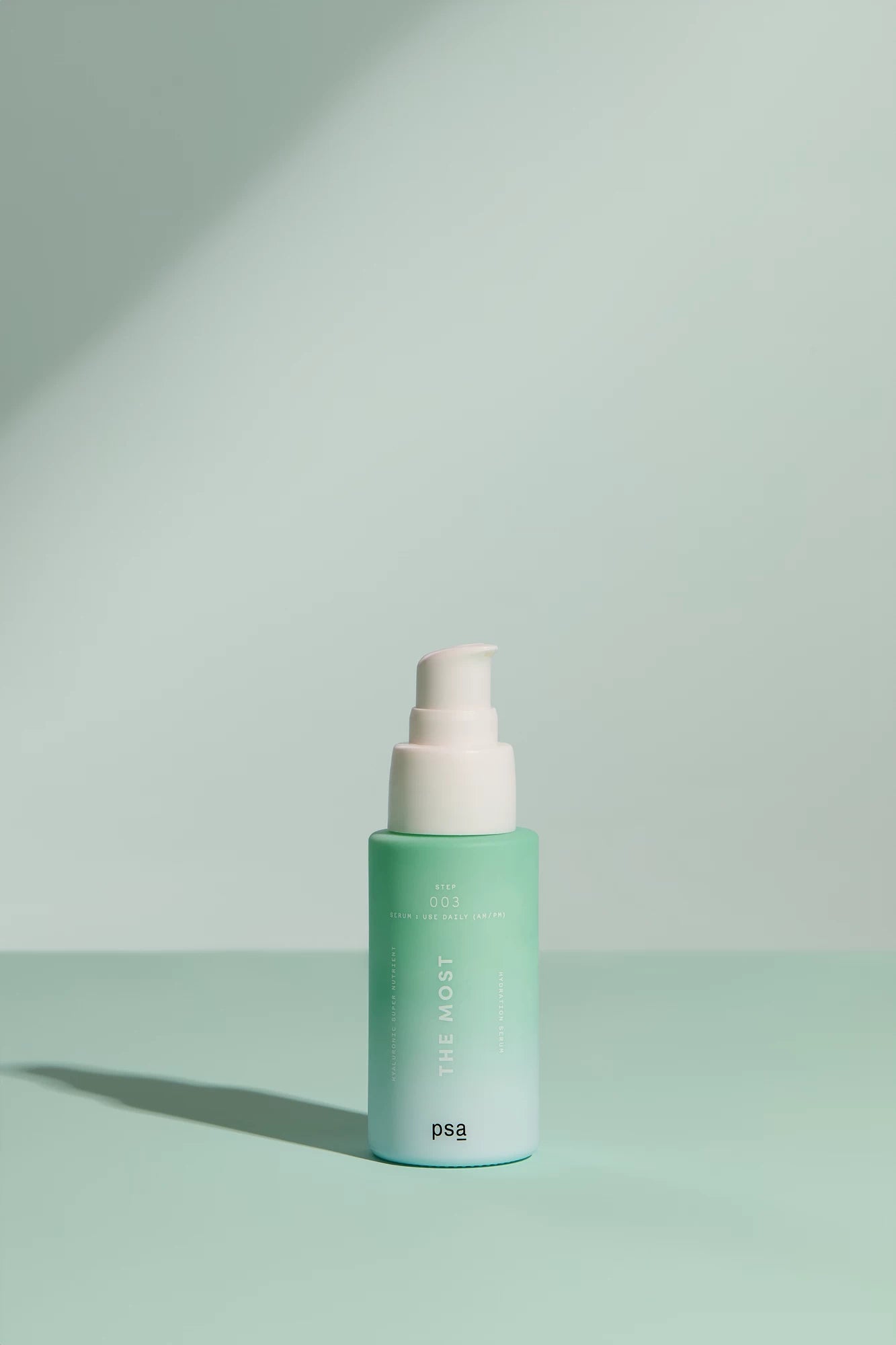 PSA Skincare The Most Serum bottle standing upright with a shadow.