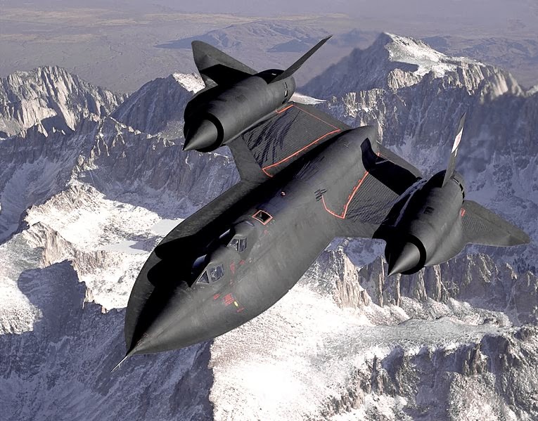 The SR-71B Blackbird, flown by the Dryden Flight Research Center as NASA 831 slices across the snow-covered southern Sierra Nevada Mountains of California