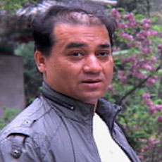 Ilham Tohti vuonna 2011