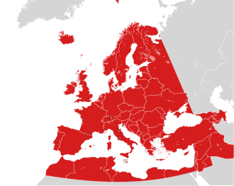 Map of countries in Europe, North Africa and Western Asia in grey, with the boundaries of the European Broadcasting Area superimposed in red