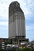 View of Sathorn Unique Tower from Saphan Taksin BTS Station