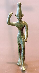 Statuette en bronze de Baal brandissant le foudre, XIVe siècle-XIIe siècle av. J.-C., trouvée à Ras Shamra, musée du Louvre.