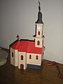 A scale model of the church made by László Kasza, displayed in the Serbian Club