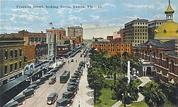 A view north along Franklin Street in 1922. The old Hillsborough County Courthouse is pictured on the right. A Confederate Monument is located in front of the courthouse, on the lower right.