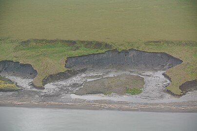 Smeltende permafrost in Herscheleiland, Canada, 2013