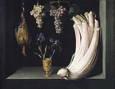 Natura morta amb card, francolí, raïm i lliris, per Felipe Ramírez (1628). Museu del Prado.