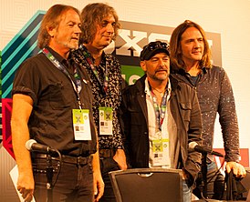 Слева направо: Стив Килби, Марти Уиллсон-Пайпер, Тим Поулс и Питер Коппс