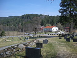 Evje Church cemetery and farm