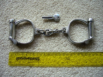 Hiatt type 104 "Darby" handcuffs and key. c. 1950s