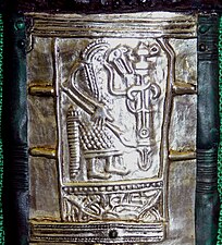 Wolf headed warrior on the Gutenstein scabbard [de].