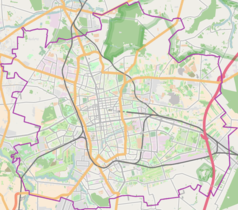 Mapa konturowa Łodzi, na dole nieco na lewo znajduje się czarny trójkącik z opisem „Rudzka Góra”
