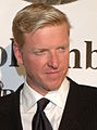 Jake Busey interpreta Tony Caine