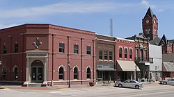The Plattsmouth Main Street Historic District is listed in the National Register of Historic Places.[1] At upper right is the clock tower of the Cass County Courthouse.