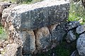 Hewn stone used as wall of house