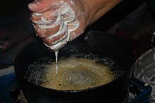 The batter poured into hot oil