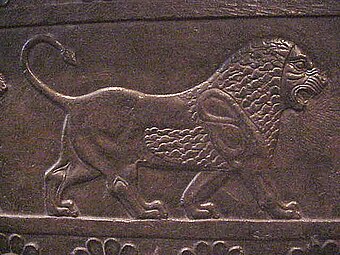 Engraving of a lion on a wall from Persepolis