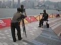 Скульптура кинооператора на Аллее звезд в Гонконге