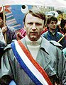 Триколірний шарф на посадовій особі національного статусу (Президент Національної асамблеї Франції)