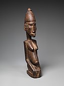 Figure of a kneeling woman; circa 1500; wood; height: 35.2 cm (13Samfuri:Fraction in.); Metropolitan Museum of Art (New York City)