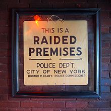 The "raided premises" sign just inside the door at the Stonewall Inn, a gay bar on Christopher Street in Manhattan's Greenwich Village