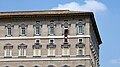 Image 10The Apostolic Palace (Palazzo Apostolico), the official residence of the Pope. Here, Benedict XVI is at the window marked by a maroon banner hanging from the windowsill at centre. (from Vatican City)