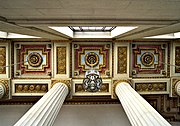 Looking up at the decorated ceiling at the side of the auditorium