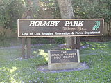 Sign of Holmby Park with a sign of the Armand Hammer Golf Course