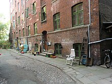 street scene with brick multi-story building