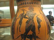 Starogrška slika na keramiki prikazuje vrnitev lovca in njegovega psa. Izdelano v Atenah med 550-530 pred našim štetjem, najdeno na Rodosu.