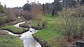 Parc de la Bressonnière vu depuis la passerelle au dessus du Ruisseau de Charbonnières