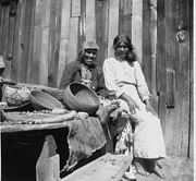 A Chukchansi woman preparing acorns for grinding, California, ca.1920