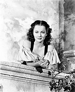 Black-and-white photo of Olivia de Havilland in 1936.