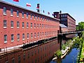Image 26Textile mills such as the Boott Mills in Lowell made Massachusetts a leader in the US Industrial Revolution. (from History of Massachusetts)