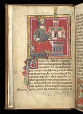 Enluminure sur fond rouge : un homme barbu couronné tient une épée dans la main droite et une abbaye dans la gauche.
