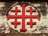 Croix de la custodie franciscaine de Terre sainte, représentant les 5 blessures du Christ.