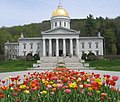 Image 16The gold leaf dome of the Vermont State House in Montpelier is visible for many miles around the city. This is the third State House on the site, and like the second, was built in the Greek Revival architectural style. It was completed in 1857. Montpelier became the state capital in 1805. (from History of Vermont)