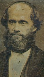 Photo of a bearded James Strang