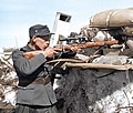 Finnish Corporal Onni Ryyppö of the 44th Border Jäger Company, use a captured Mosin-Nagant sniper rifle with PEM scope in the frontlines at Valkeasaari (Beloostrov), Karelian isthmus, 15 April 1942.