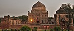 Mosque with the dalans and courtyard and the Bara Gumbad (the domed entrance to the mosque)