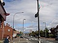 Tricolori irlandesi in un quartiere nazionalista nel North Belfast, accompagnati da bandiere di gruppi cattolici locali