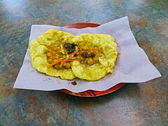 Doubles vadai dari negara Trinidad dan Tobago adalah snak yang terdiri dari dua baras yang diisi dengan kari channa (kacang Arab yang dimasak dengan rempah).