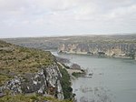 A large river flows through a canyon.