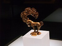 金怪獣像、紀元前475-221年の戦国時代。神木市納林高兔村出土。陝西省歴史博物館所蔵[121]
