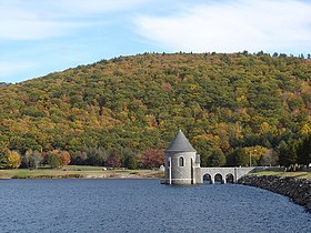 The Saville Dam impounds the East Branch Farmington River to form Barkhamsted Reservoir.