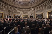 Mourners circumambulate the casket of George Bush during the lying in state on December 3, 2018.